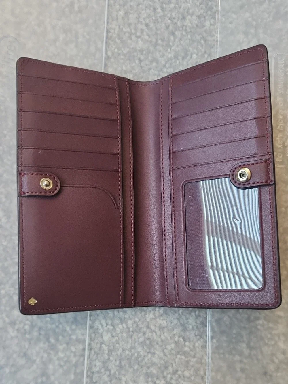 kate spade plum Saffiano leather continental wallet